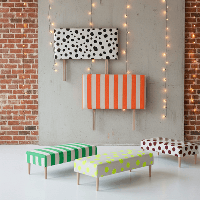 Upcycled Upholstery sustainable hand-printed stripe linen headboards, ottomans and footstools