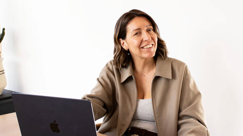 Zoe surrounded by TreatBoxes
