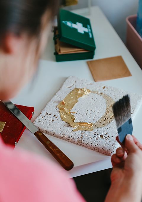 Letters by Em, work in progress laying gold leaf