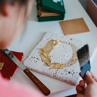 Letters by Em, work in progress laying gold leaf