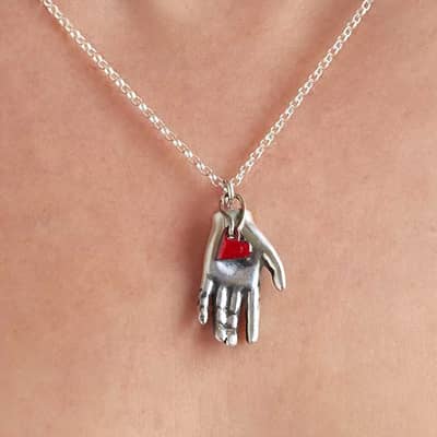 Red Heart in Barbie Hand from All That Glitters