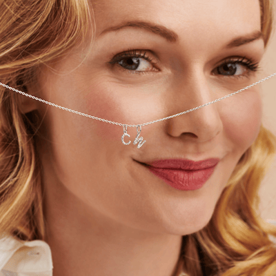 Claudette Worters diamond letter pendant in sterling silver