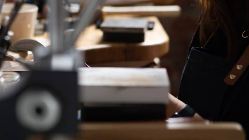 Zoe, Hello Halfpenny at her bench hand making jewellery