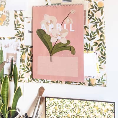 A floral wall calendar - each page decorated with large floral illustrations