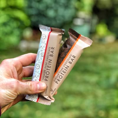 Photo of the dark chocolate premium protein bar and also the dark chocolate and ginger premium protein bar
