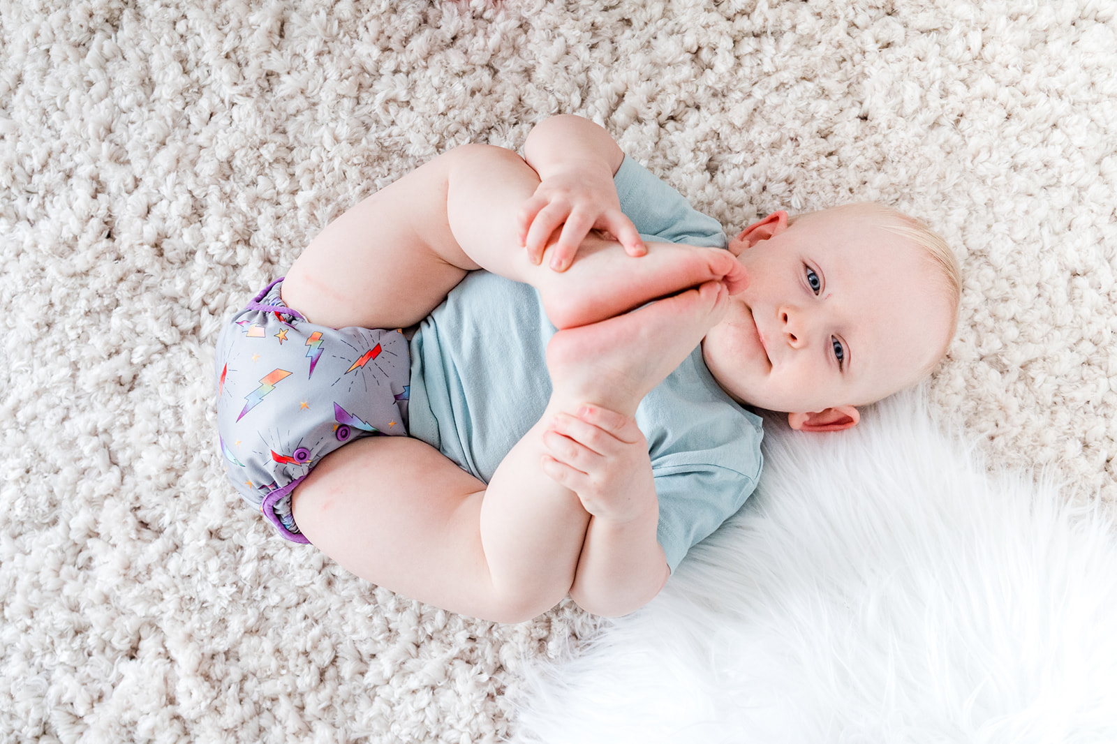 baby wearing cloth nappy