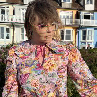 Founder of The Fruit Moth Nicole wearing her Ophelia blouse in Liberty Elysia Meadow