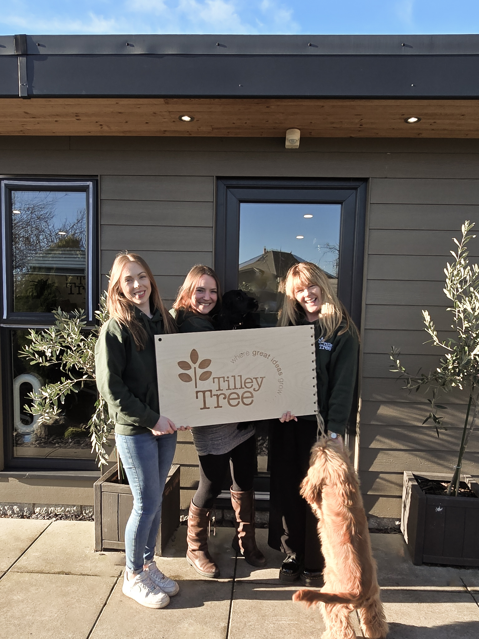 Jade, Sasha and Claire - with spaniels Moxxi and Roux, outside our garden studio on a rare sunny day in Morecambe!