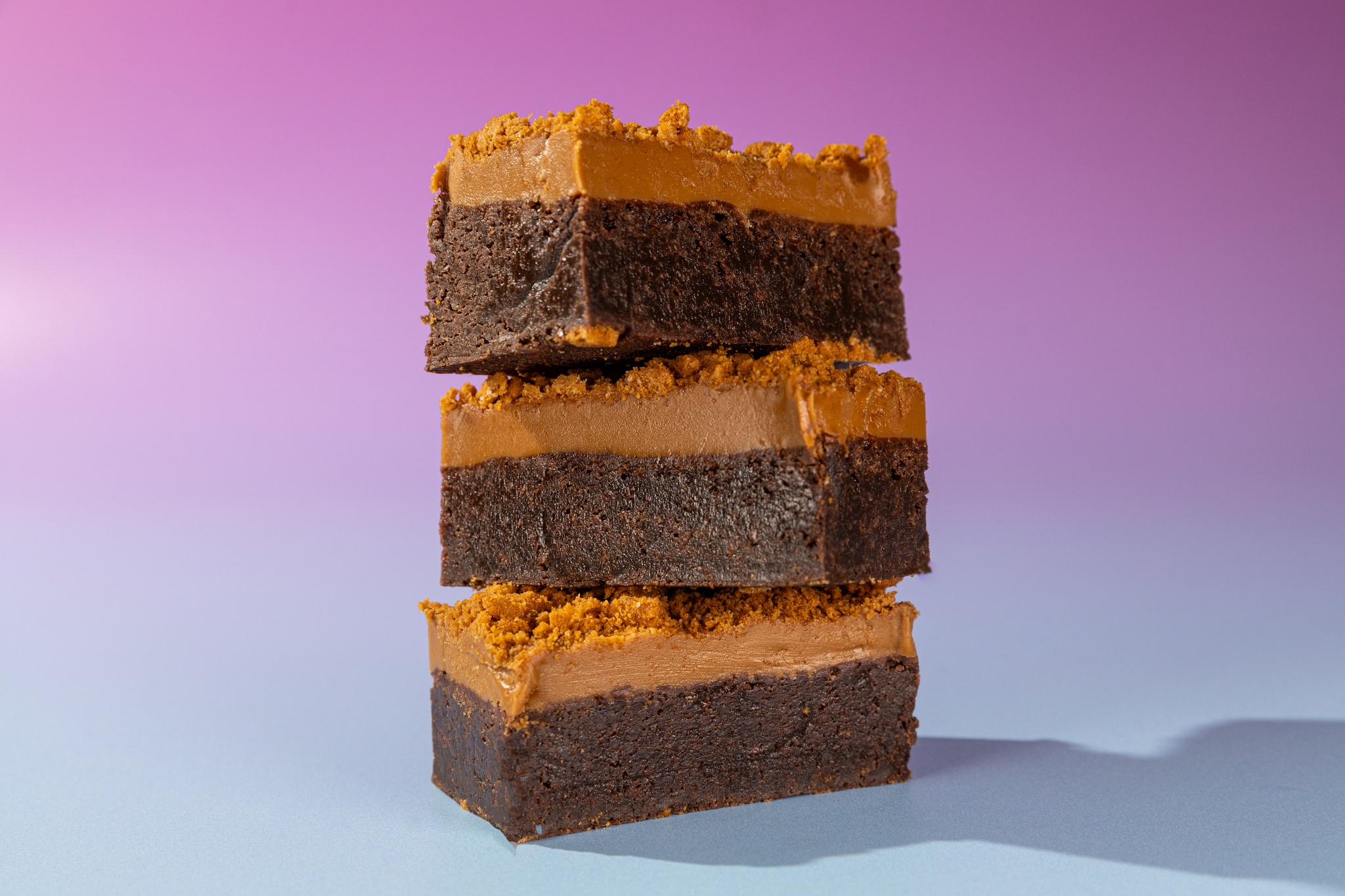 A stack of our fudgy Biscoff brownies