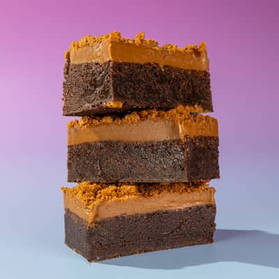A stack of our fudgy Biscoff brownies