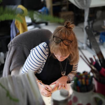 olivia whitworth Illustration with colourful buildings and writing