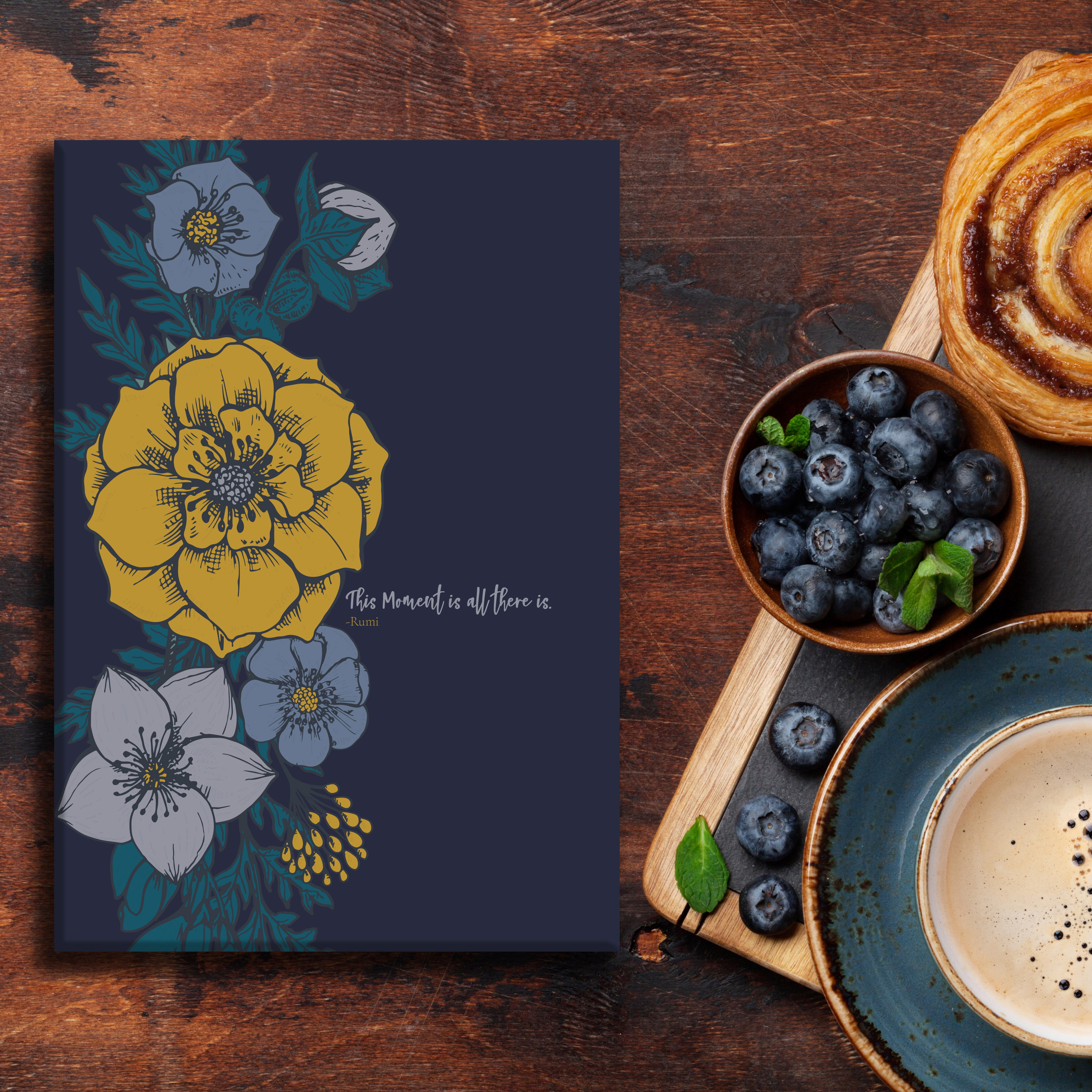 Floral planner, with cup of coffee, pastry and berries