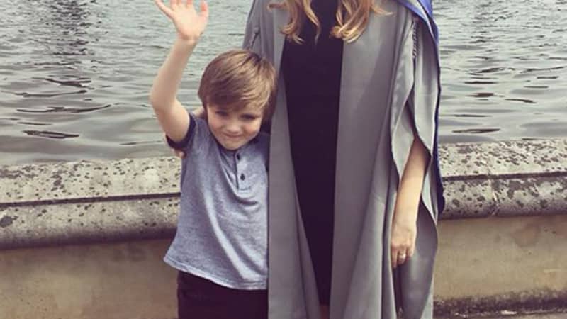 Sarah and her son on her graduation day