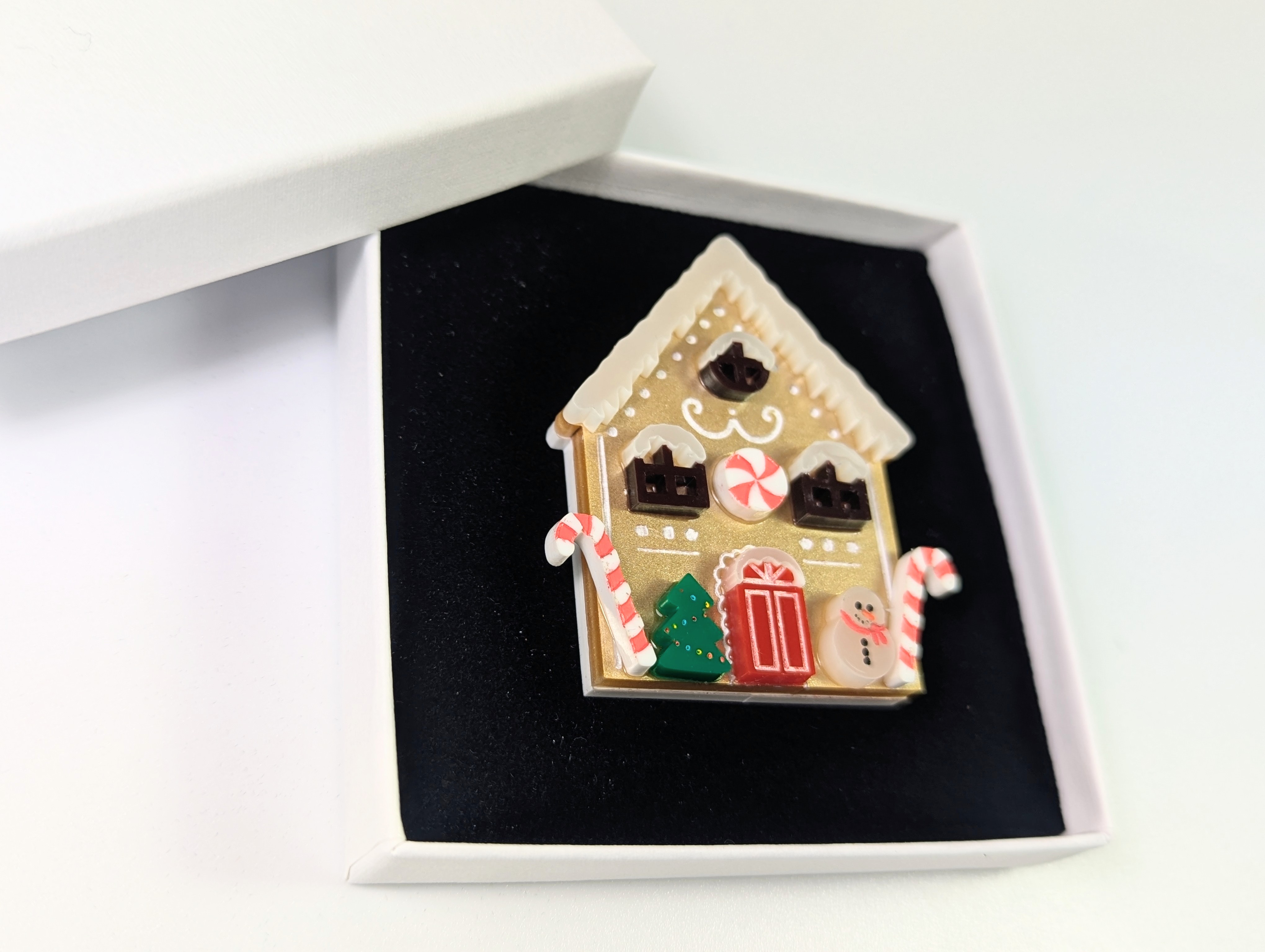 A ginger bread house brooch