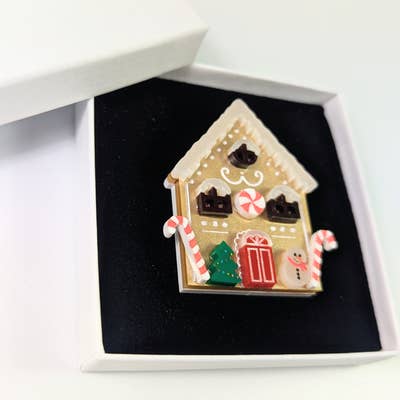 A ginger bread house brooch