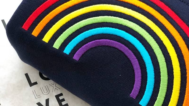 Dreamer design features a lovingly embroidered rainbow motif on the reverse and the word Dreamer on the front in our signature rainbow text.