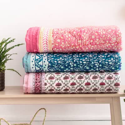 Effortless trading block printed quilts