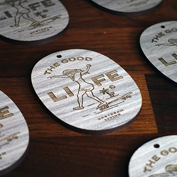 Collection of wooden air fresheners on a table