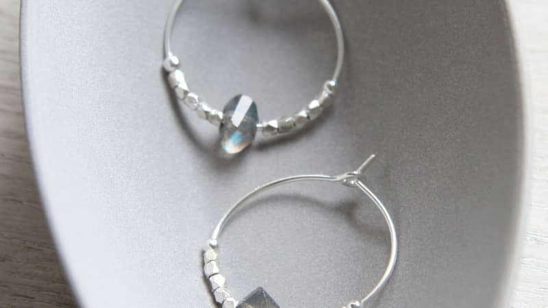These are the Sterling Silver And Labradorite Hoops. I love working fair trade precious metal nuggets into my pieces, which are shown here in fine silver.