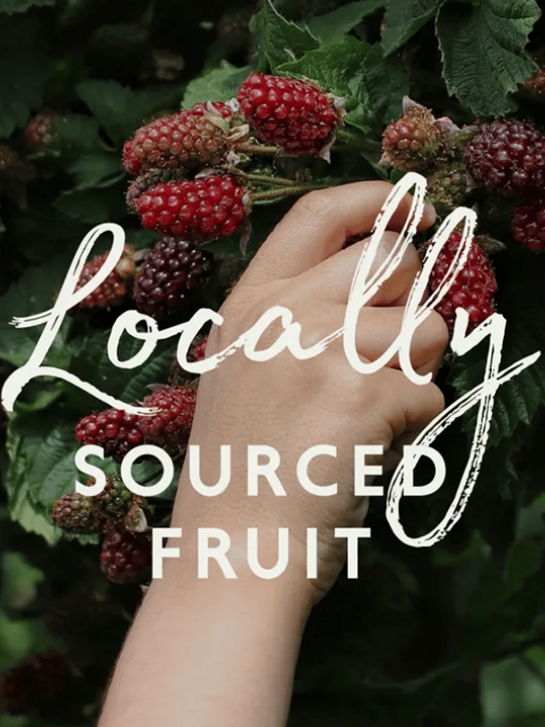 Picking berries with text 'Locally sourced fruit'