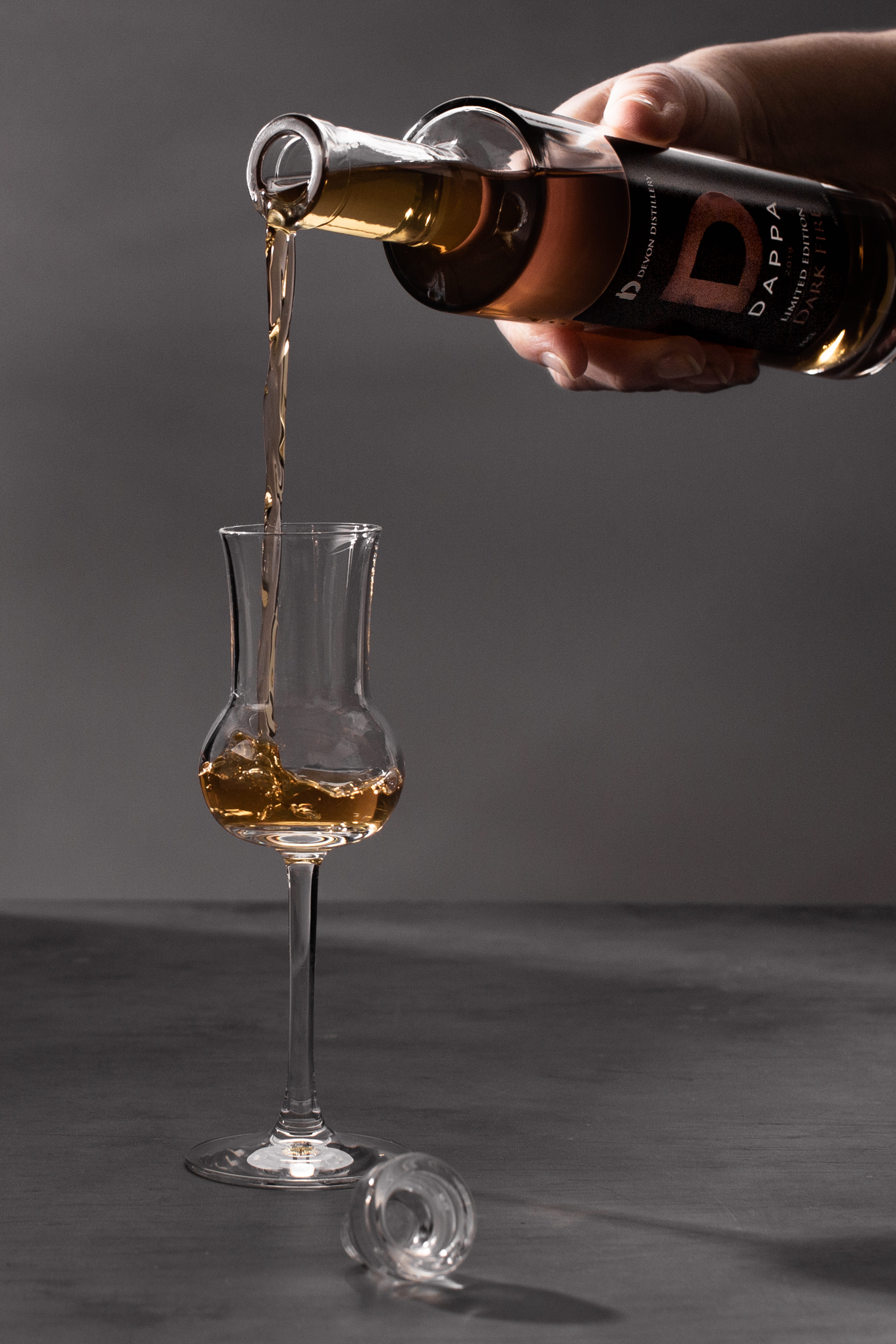 Dark Fire being poured into a glass