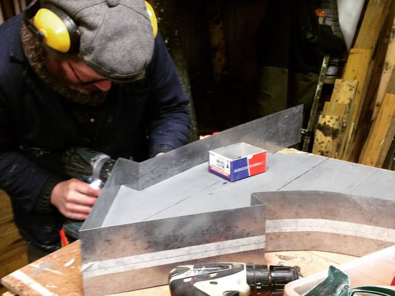 Dusty creating vintage metal signage