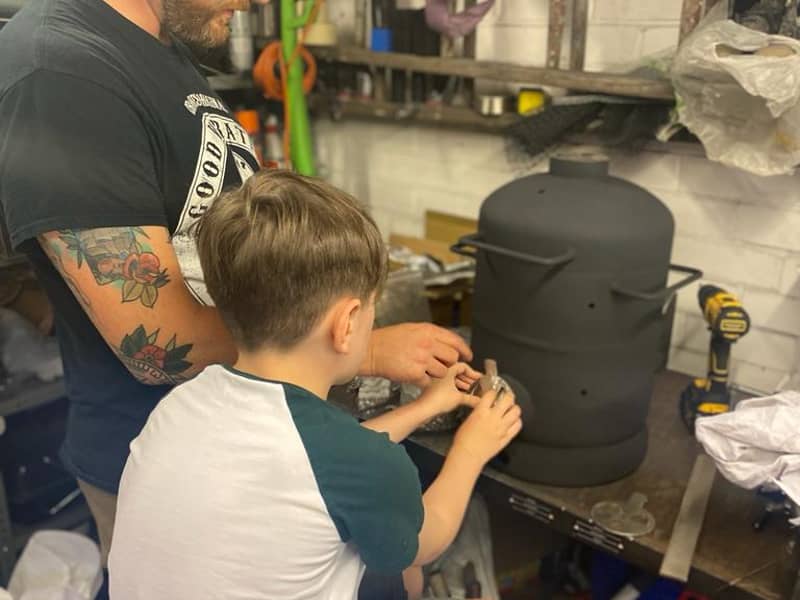 Building a barbecue with my son.