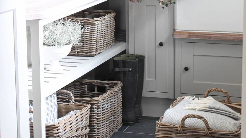 boot room with grey wicker rattan baskets