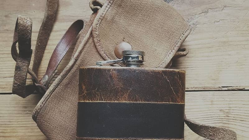 personalised leather hip flask with roman numerals