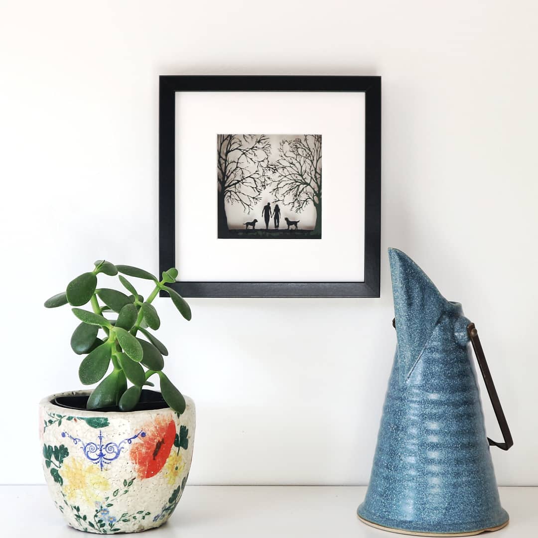 Couple Walking with Dogs