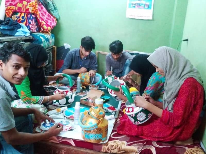 Artisans in India making Suzie Bidlake products