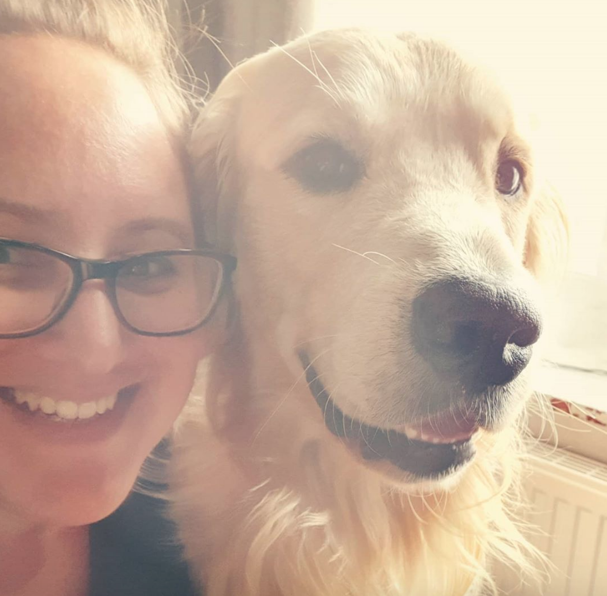 Purple Tree Designs owner with dog