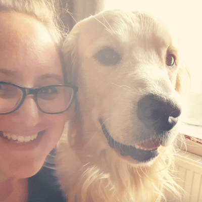 Purple Tree Designs owner with dog