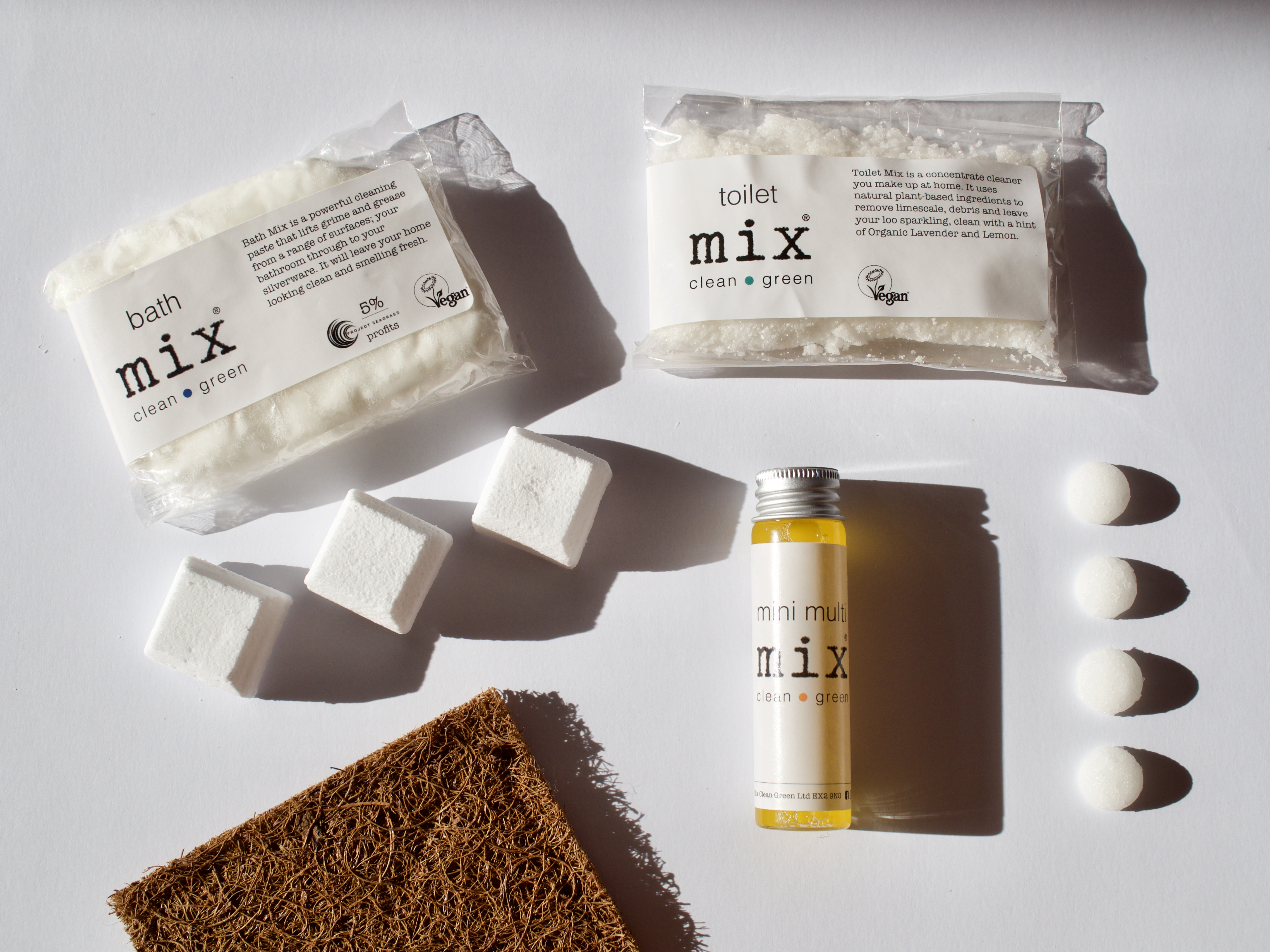 plastic free, zero waste eco cleaning kit in home compostable pouches on white background