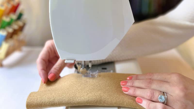 Owner and creator of felt food company Kinder Cookhouse sat working at her sewing machine.