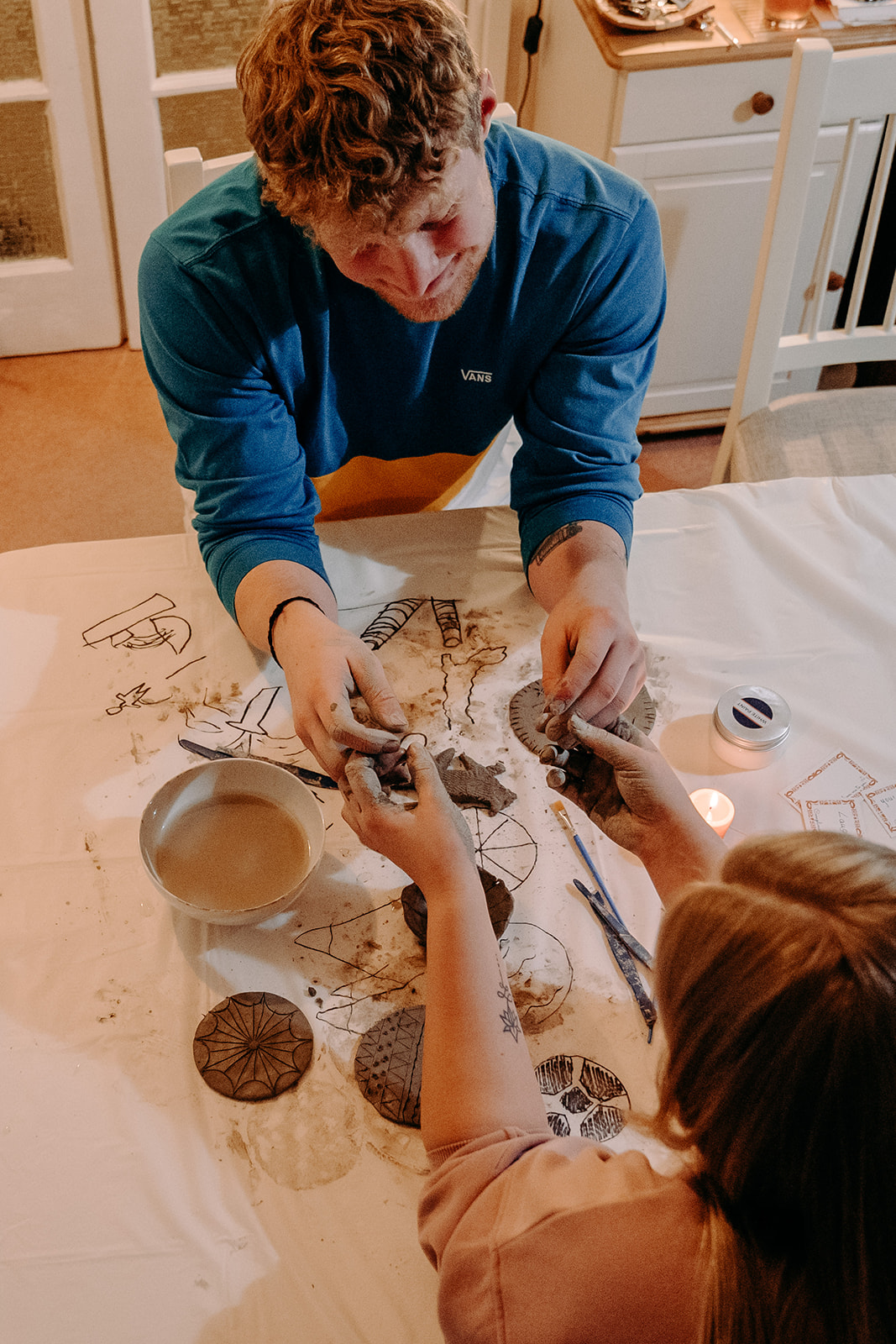 Couple holding hands pottery making Box42