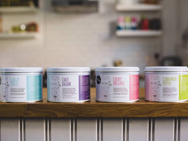 4 different luxury Fruit Cake Gifts in pretty tins