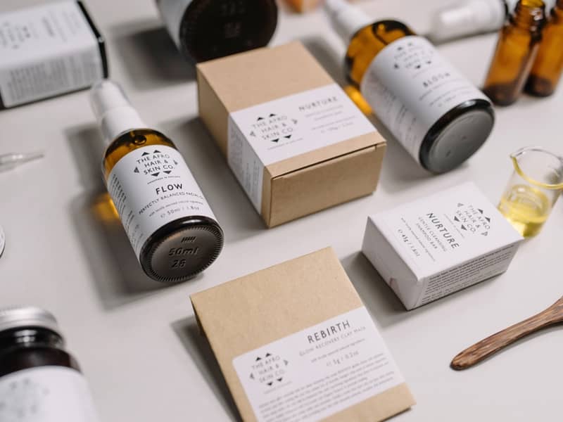 beauty products in sustainable packaging arranged decoratively