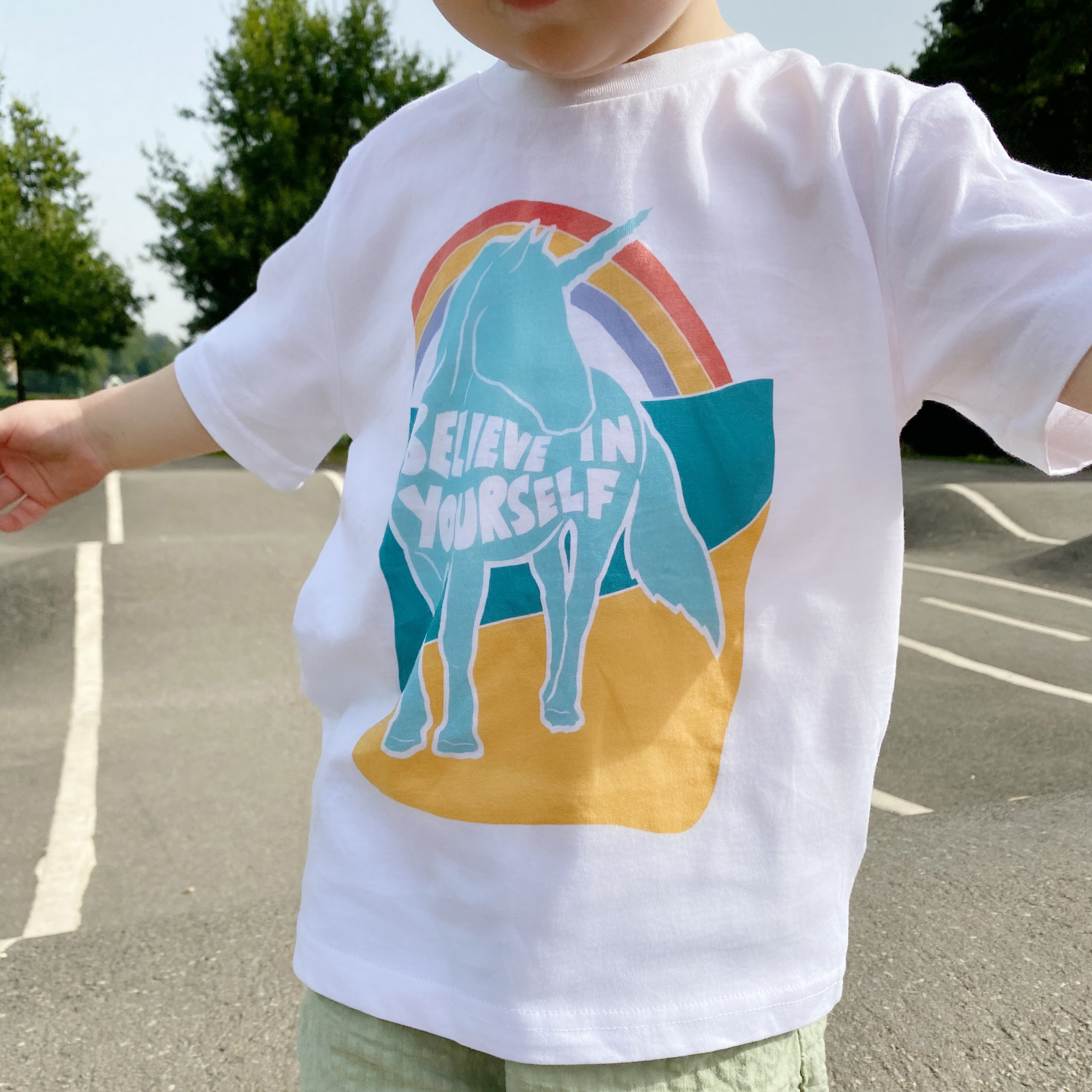 A collection of bespoke illustrations, family portraits and typography prints arranged on the bedroom wall by la Fam Illustration.