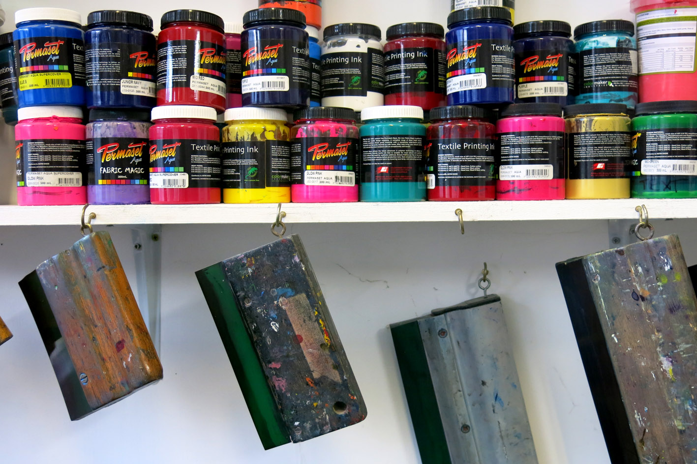 Screen printing inks and squeegee