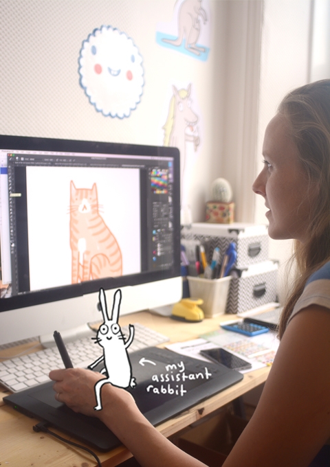 Sarah drawing at her desk