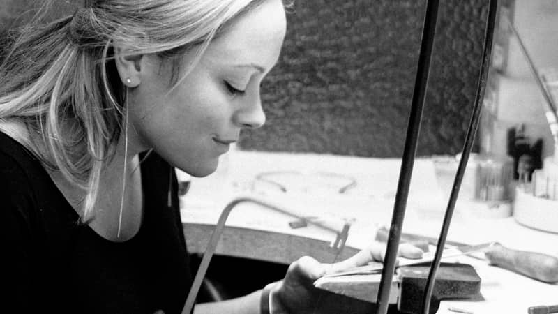 Jewellery designer Emma-Kate making jewellery at her workbench