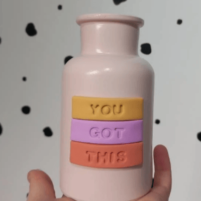 Pastel pink mini vase decorated with the words 'you got this'