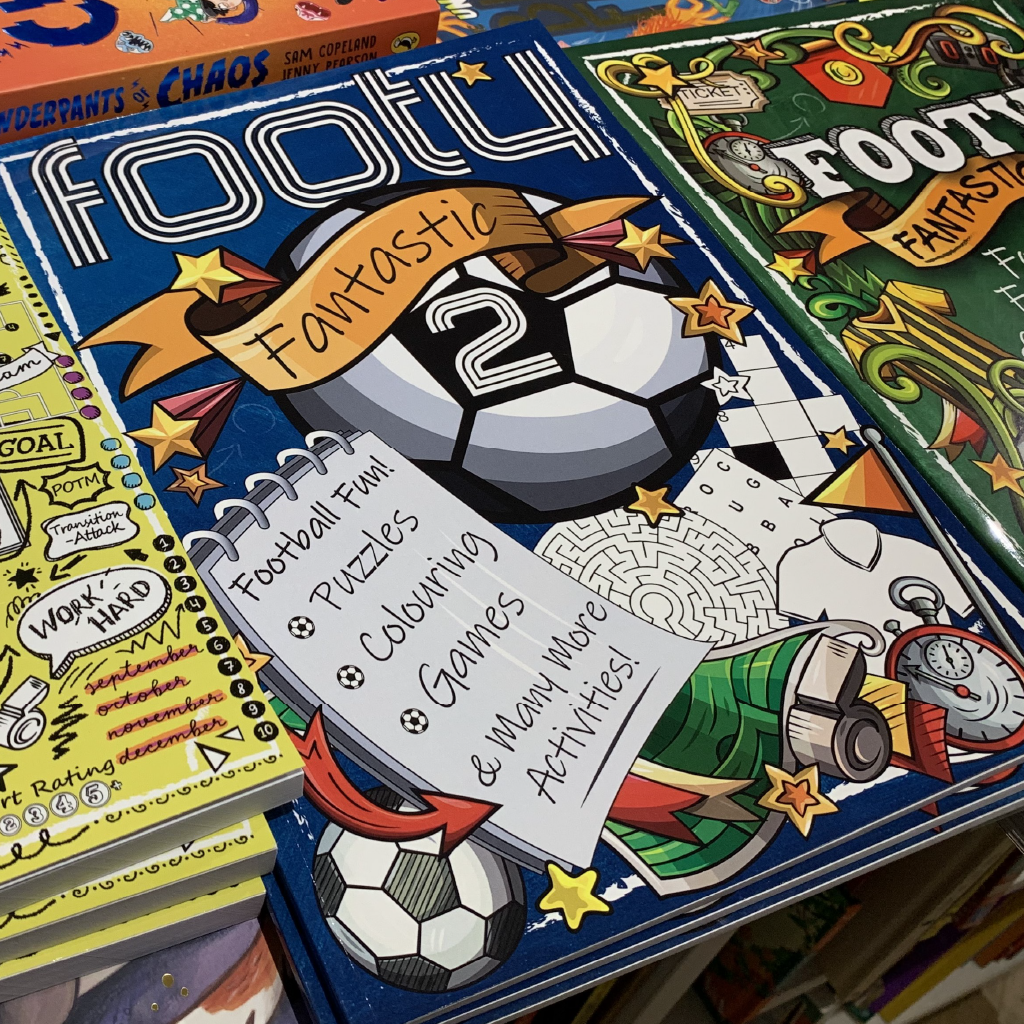 Our activity books, ready for sale.