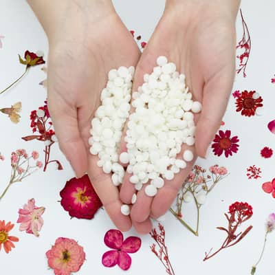 cera cotton wax and pressed flowers