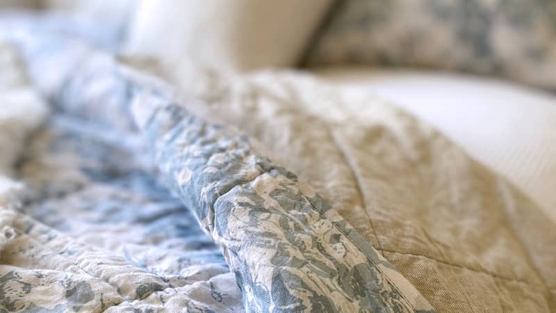 The Everly Quilted Hand Painted Floral Throw Blanket Quilt In Duck Egg Blue Sustainable Eco Friendly Linen Cotton