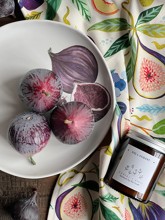Fruit ceramics, candles and tea-towels