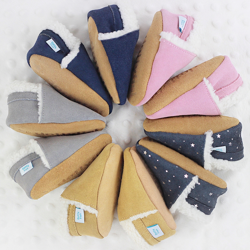 Dotty Fish Suede slippers in five colours, arranged in a circle
