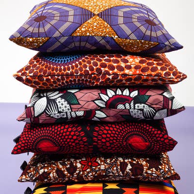colourful african print cushions covers in kente, pink, red, orange and purple prints