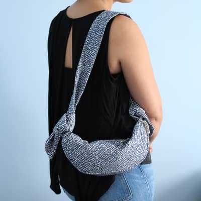 Blue Denim coloured Cross Body Shoulder bag on model